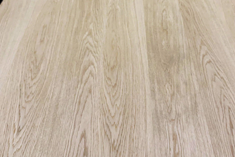 Close-up of a light wood finish surface